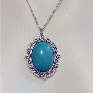 Elegant Silver and Blue Pendant Necklace